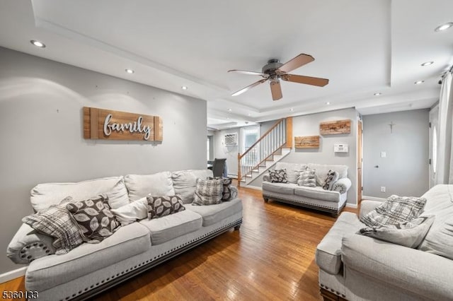 100 N 8th St, Paterson City, NJ 07522 - living area featuring a raised ceiling, recessed lighting, wood finished floors, stairway, and a ceiling fan