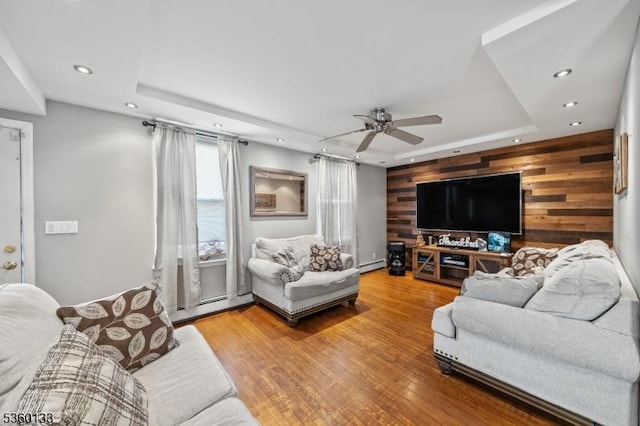 100 N 8th St, Paterson City, NJ 07522 - living area featuring a tray ceiling, ceiling fan, recessed lighting, wood walls, and wood finished floors