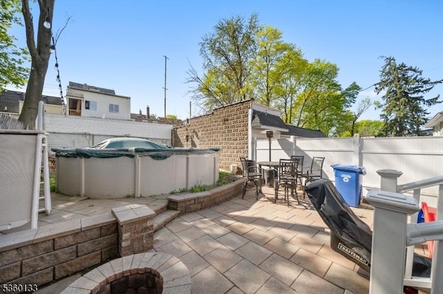 100 N 8th St, Paterson City, NJ 07522 - fenced backyard featuring a patio area and outdoor dining area
