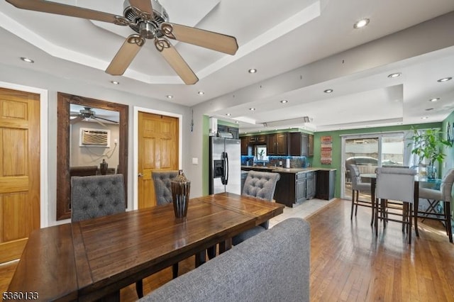 100 N 8th St, Paterson City, NJ 07522 - dining space with a tray ceiling, ceiling fan, light wood finished floors, and recessed lighting