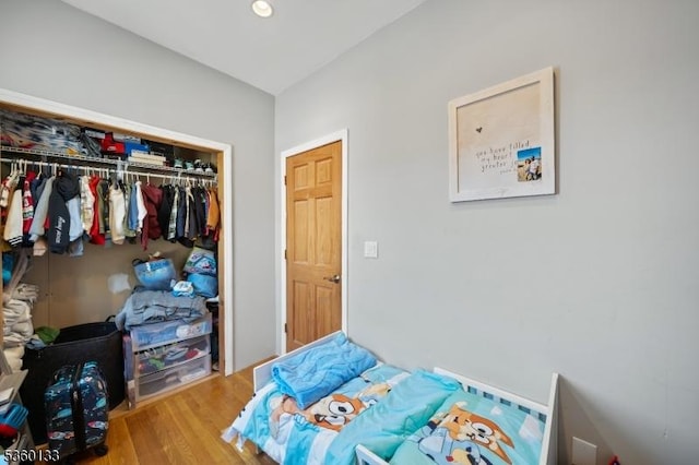 100 N 8th St, Paterson City, NJ 07522 - bedroom with wood finished floors, a closet, and recessed lighting