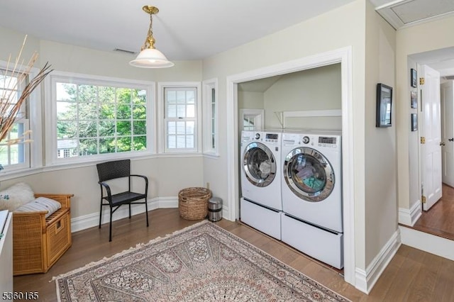 760 Rosemont Ringoes Rd, Delaware Twp, NJ 08559 - laundry area featuring separate washer and dryer, wood finished floors, and baseboards