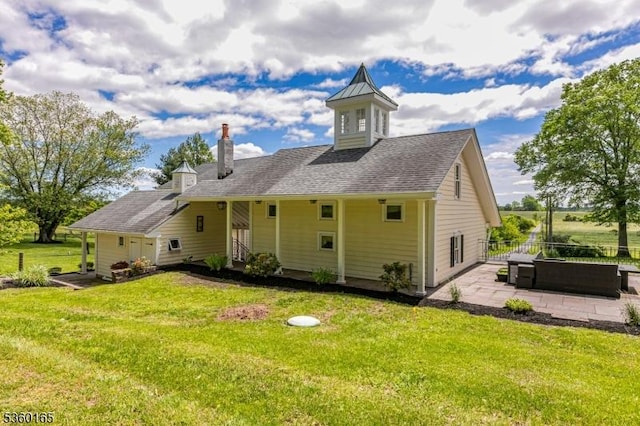 760 Rosemont Ringoes Rd, Delaware Twp, NJ 08559 - back of property with a chimney, a yard, and a patio