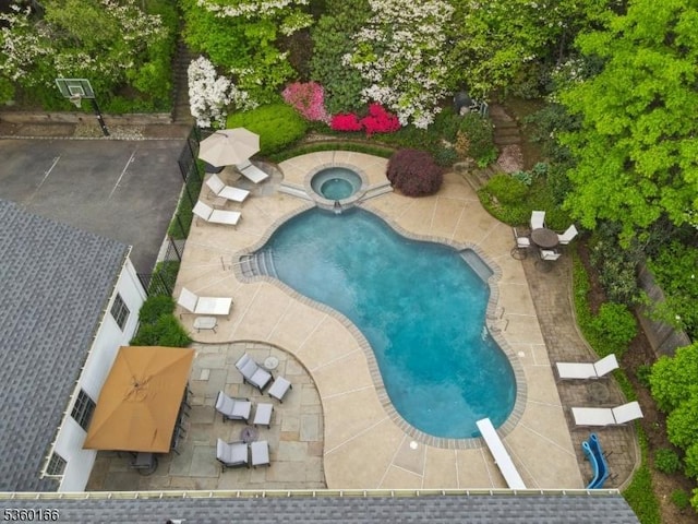 70 Falmouth St, Millburn Twp, NJ 07078 - swimming pool with an in-ground hot tub and a patio