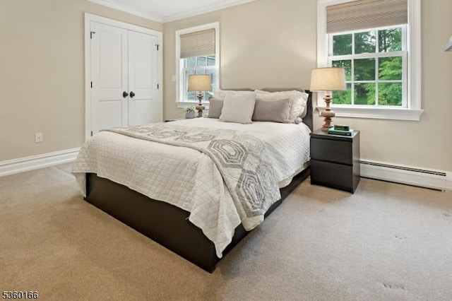 70 Falmouth St, Millburn Twp, NJ 07078 - bedroom featuring a baseboard heating unit, ornamental molding, a closet, and carpet floors