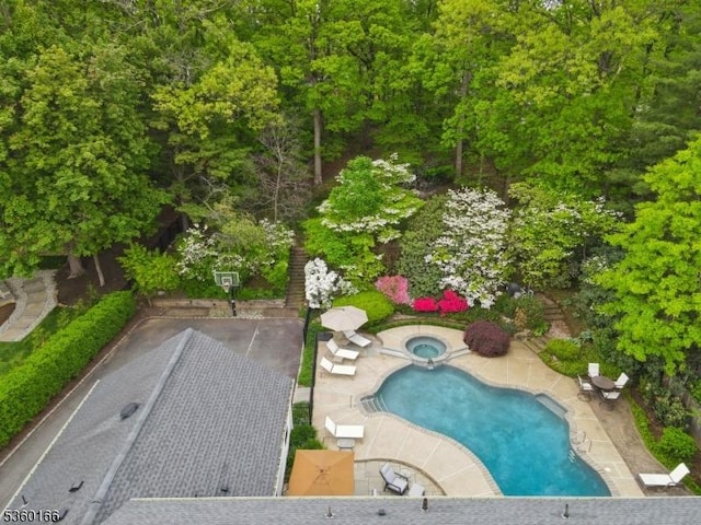 70 Falmouth St, Millburn Twp, NJ 07078 - outdoor pool with an in-ground hot tub and a patio area