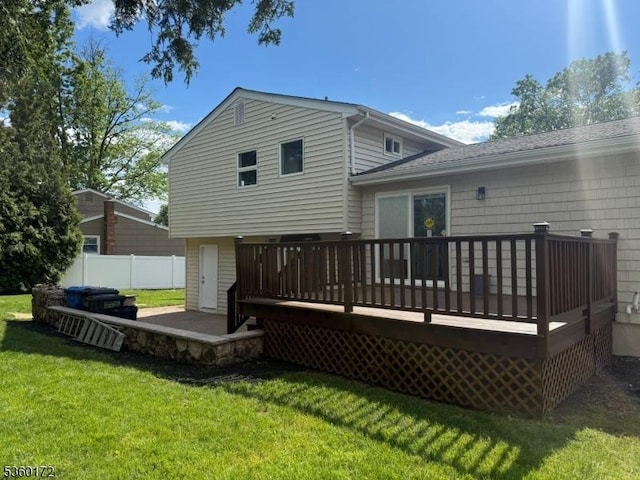 20 Wick Dr, Woodbridge Twp, NJ 08863 - back of property featuring a deck and a shingled roof