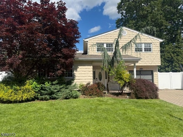 20 Wick Dr, Woodbridge Twp, NJ 08863 - view of front of property with a garage and decorative driveway