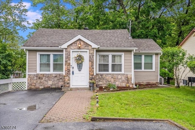4 Alfred Way, Hopatcong Boro, NJ 07843 - view of front of property with stone siding, a front lawn, and a shingled roof