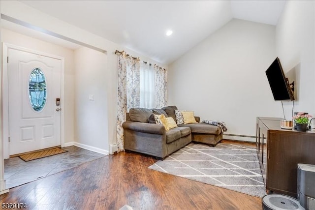 4 Alfred Way, Hopatcong Boro, NJ 07843 - foyer entrance featuring vaulted ceiling, a baseboard heating unit, wood finished floors, and baseboards