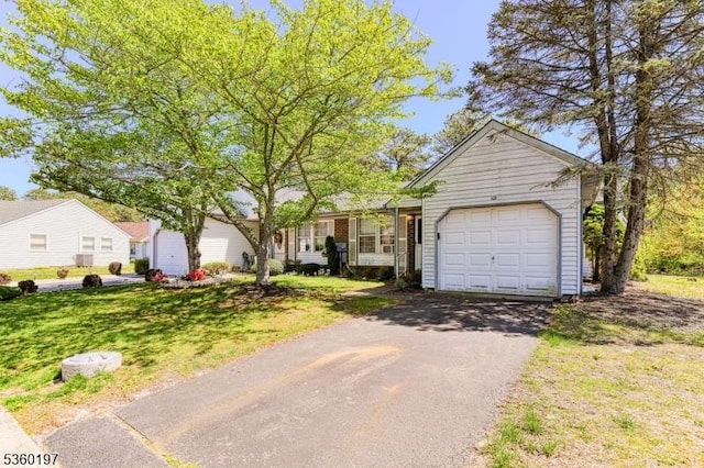 11 B Greenwood Ln Unit Sec62, Manchester Twp, NJ 08759 - ranch-style house featuring an attached garage, asphalt driveway, and a front yard