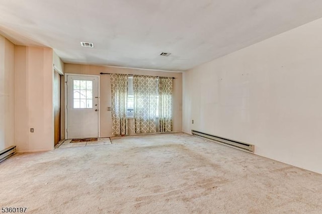 11 B Greenwood Ln Unit Sec62, Manchester Twp, NJ 08759 - spare room featuring a baseboard radiator and carpet flooring