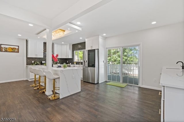254 Springfield Ave, Rutherford Boro, NJ 07070 - kitchen featuring stainless steel refrigerator with ice dispenser, light countertops, dark wood-type flooring, white cabinets, and recessed lighting