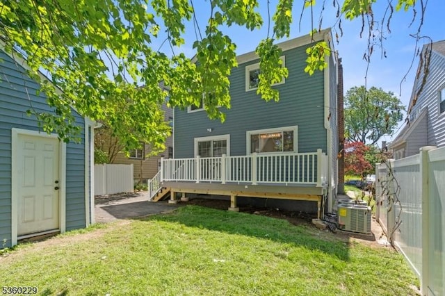 254 Springfield Ave, Rutherford Boro, NJ 07070 - rear view of property with a deck, central air condition unit, and an outbuilding