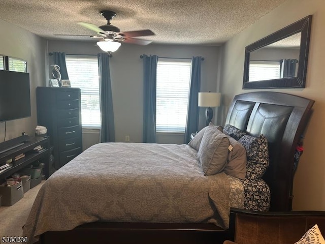 8 Bristol Dr, North Brunswick Twp, NJ 08902 - bedroom with a textured ceiling, carpet floors, and a ceiling fan