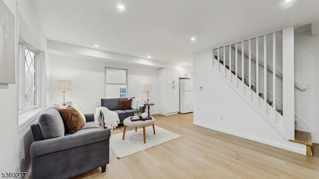 13 Prospect St, Metuchen Boro, NJ 08840 - living area with stairs, light wood-style flooring, recessed lighting, and baseboards