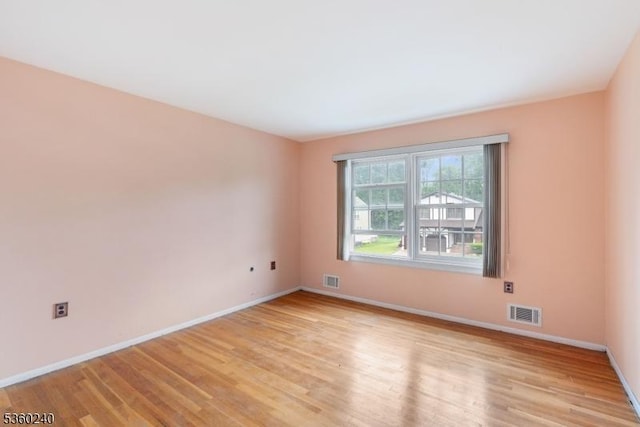 712 Kaminski Dr, Rahway City, NJ 07065 - unfurnished room featuring light wood-style flooring and baseboards
