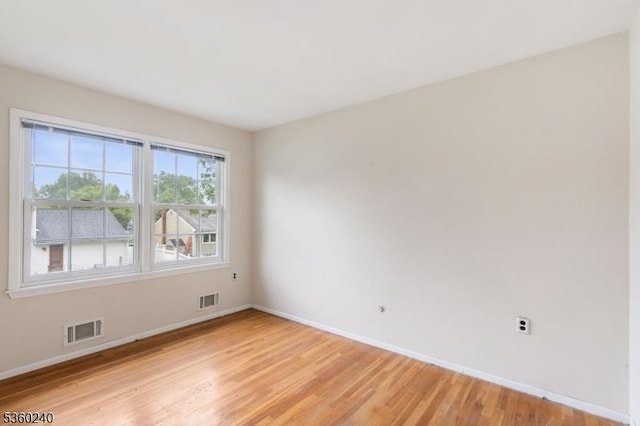 712 Kaminski Dr, Rahway City, NJ 07065 - empty room with baseboards and light wood-type flooring