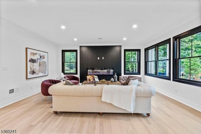 10 Wilson Ave, Wayne Twp, NJ 07470 - living area featuring light wood-type flooring, recessed lighting, baseboards, and healthy amount of natural light