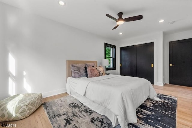 10 Wilson Ave, Wayne Twp, NJ 07470 - bedroom with baseboards, wood finished floors, a closet, recessed lighting, and ceiling fan