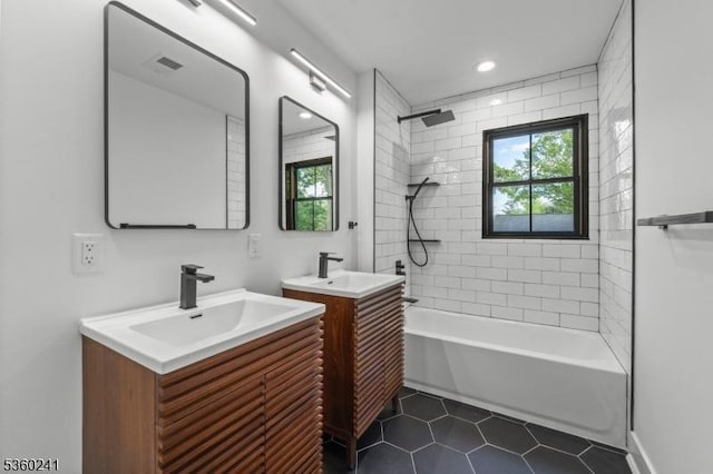 10 Wilson Ave, Wayne Twp, NJ 07470 - bathroom featuring healthy amount of natural light, two vanities, tile patterned floors, bathtub / shower combination, and recessed lighting