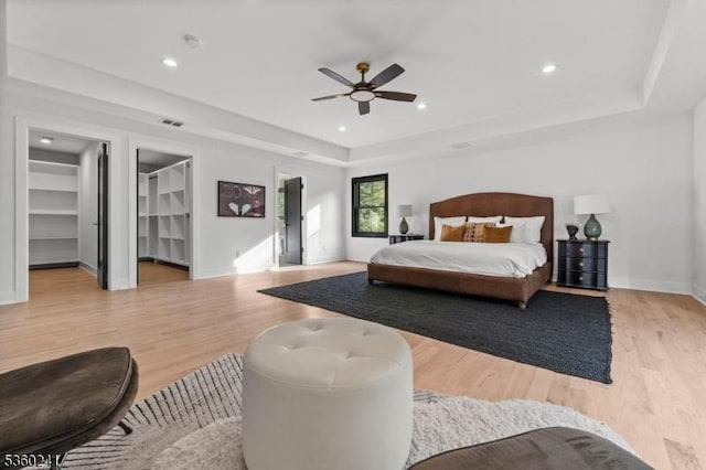 10 Wilson Ave, Wayne Twp, NJ 07470 - bedroom with a tray ceiling, wood finished floors, recessed lighting, baseboards, and a ceiling fan