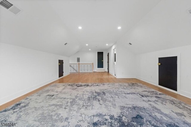 10 Wilson Ave, Wayne Twp, NJ 07470 - bonus room featuring light wood-style floors, lofted ceiling, baseboards, and recessed lighting