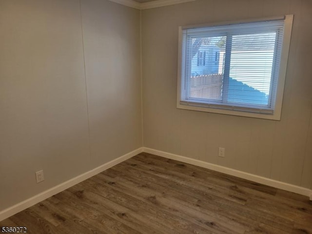 131 Douglas Dr, Jackson Twp, NJ 08527 - empty room with wood finished floors, baseboards, and crown molding