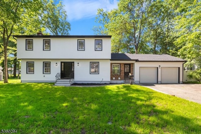 17 New England Dr, Parsippany-Troy Hills Twp, NJ 07034 - colonial-style house featuring an attached garage, a front lawn, and driveway