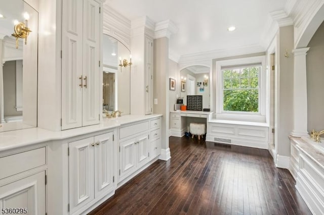 66 Fernwood Rd, Summit City, NJ 07901 - full bathroom with ornamental molding, hardwood / wood-style flooring, double vanity, decorative columns, and a bath