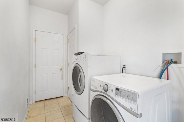 3 Spyglass Hl, Fredon Twp, NJ 07860 - laundry area featuring washing machine and dryer and light tile patterned floors