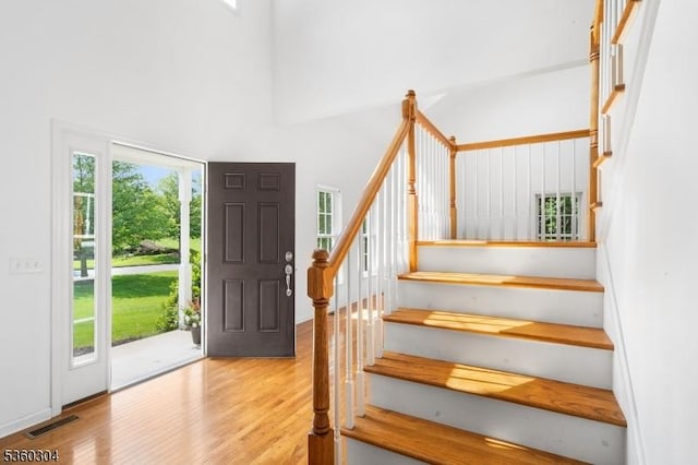 3 Spyglass Hl, Fredon Twp, NJ 07860 - entryway featuring stairs, wood finished floors, and a high ceiling