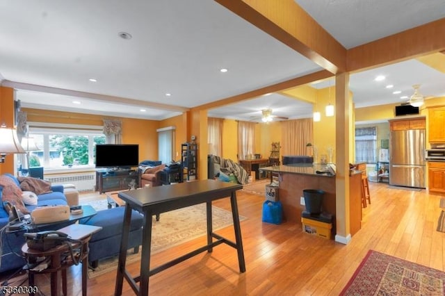 36 William St, West Orange Twp, NJ 07052 - living area featuring radiator heating unit, light wood-type flooring, a ceiling fan, and recessed lighting