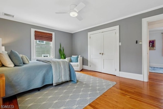 51 S Pierson Rd, Maplewood Twp, NJ 07040 - bedroom featuring ornamental molding, wood finished floors, a ceiling fan, and a closet