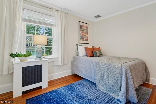 51 S Pierson Rd, Maplewood Twp, NJ 07040 - bedroom with wood finished floors and ornamental molding