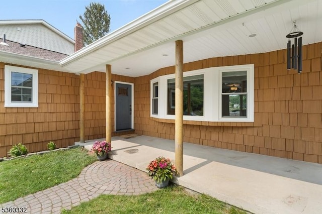 111 Lake Dr, Byram Twp, NJ 07874 - property entrance featuring a chimney and a patio area