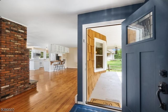 111 Lake Dr, Byram Twp, NJ 07874 - doorway to outside featuring wood finished floors