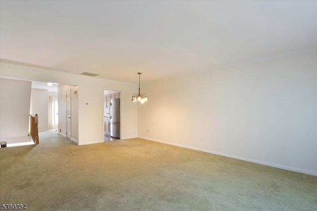 60 Mews Ln Unit 60, South Orange Village Twp, NJ 07079 - spare room featuring light carpet, a chandelier, and baseboards