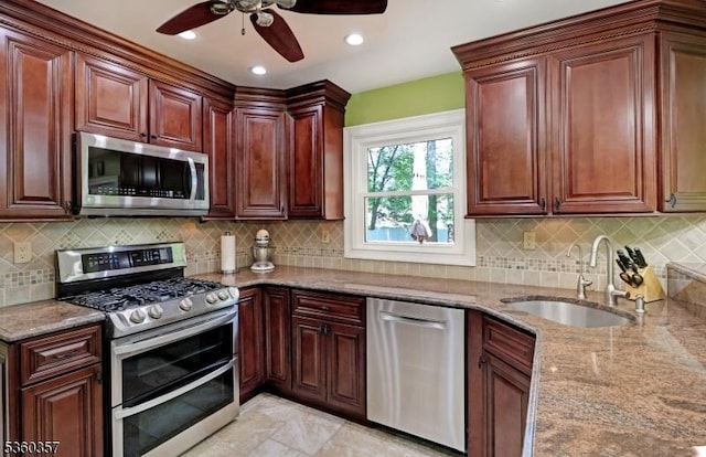 17 Druid Hill Dr, Parsippany-Troy Hills Twp, NJ 07054 - kitchen with stainless steel appliances, a sink, ceiling fan, light stone countertops, and decorative backsplash