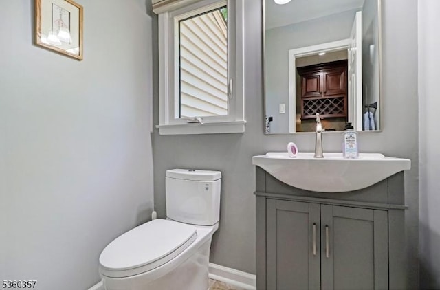 17 Druid Hill Dr, Parsippany-Troy Hills Twp, NJ 07054 - bathroom with baseboards, healthy amount of natural light, vanity, and toilet