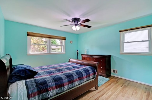 17 Druid Hill Dr, Parsippany-Troy Hills Twp, NJ 07054 - bedroom with light wood finished floors, baseboards, and a ceiling fan