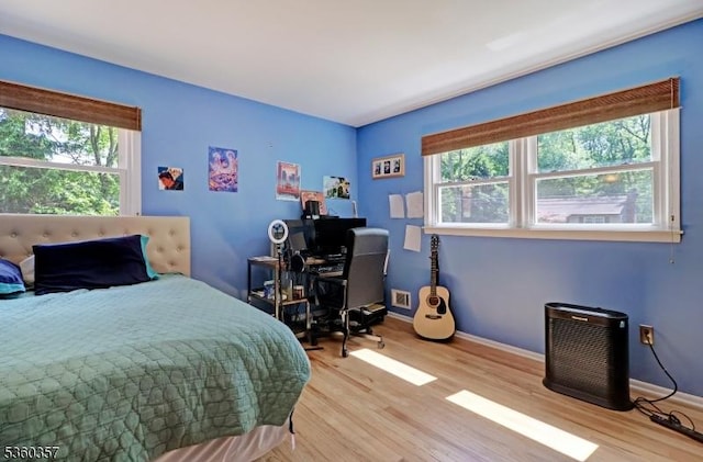 17 Druid Hill Dr, Parsippany-Troy Hills Twp, NJ 07054 - bedroom with light wood finished floors, baseboards, and a desk