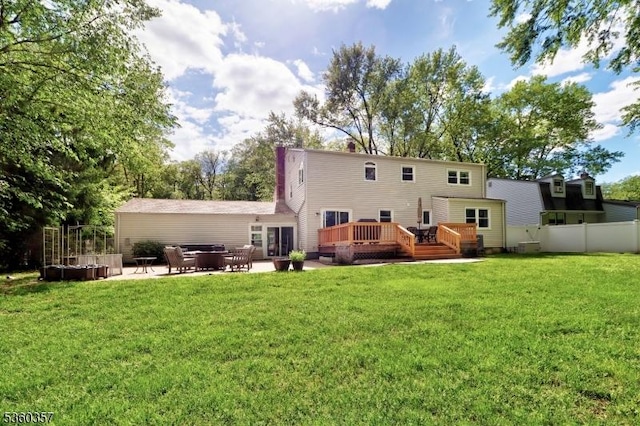 17 Druid Hill Dr, Parsippany-Troy Hills Twp, NJ 07054 - rear view of house with a wooden deck and a patio