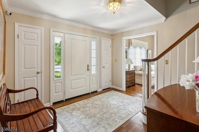 17 Steeple Chase Ct, Bedminster Twp, NJ 07921 - entrance foyer featuring crown molding, dark wood-style flooring, stairway, and baseboards