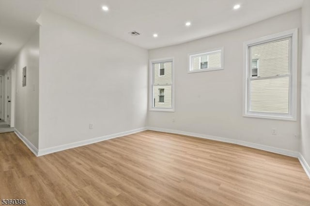 261 22nd St, Irvington Twp, NJ 07111 - empty room featuring light wood-style flooring, baseboards, and recessed lighting