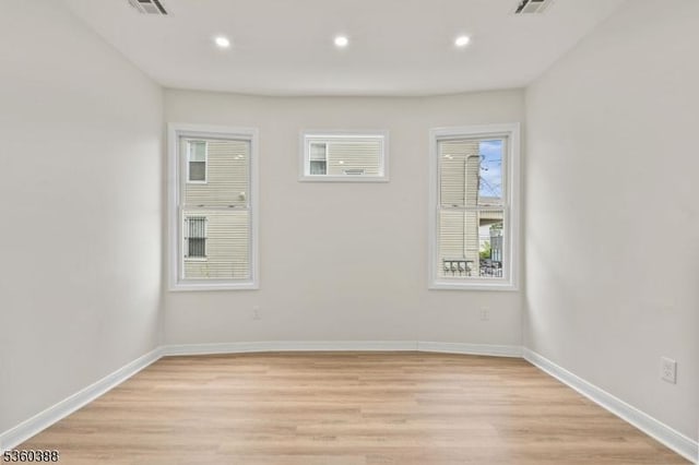 261 22nd St, Irvington Twp, NJ 07111 - empty room with light wood-type flooring, recessed lighting, and baseboards