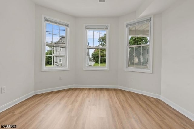 261 22nd St, Irvington Twp, NJ 07111 - empty room featuring light wood-style floors and baseboards