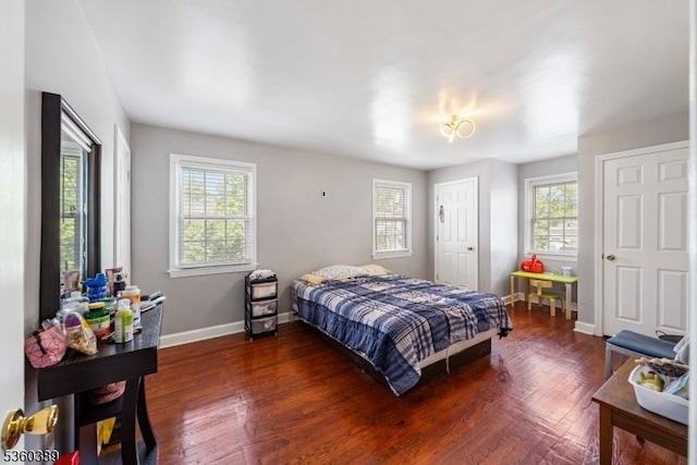 896 Maurice Ave, Rahway City, NJ 07065 - bedroom featuring multiple windows, baseboards, and dark wood finished floors