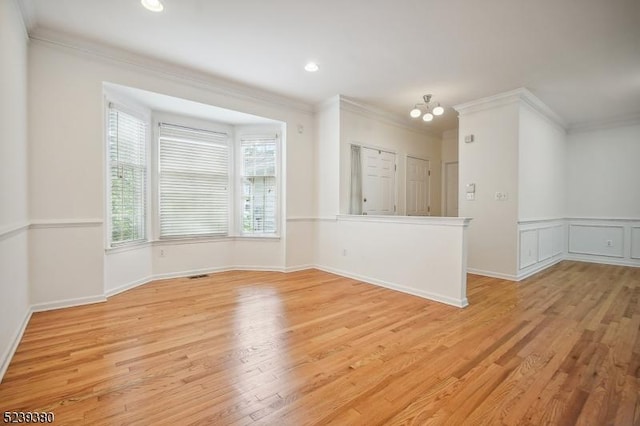 12 Hudson Dr, Bernards Twp, NJ 07920 - empty room featuring crown molding, light wood finished floors, a chandelier, and recessed lighting