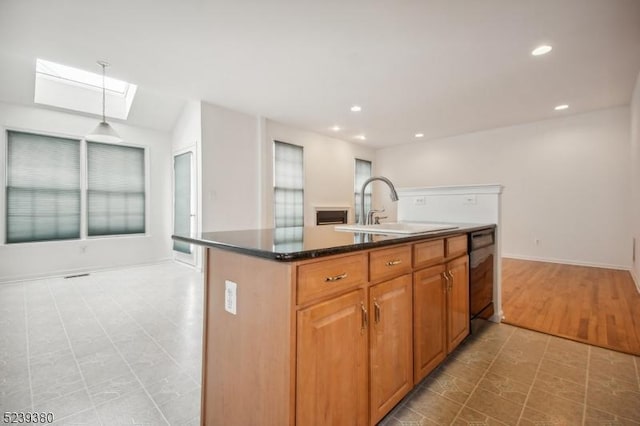 12 Hudson Dr, Bernards Twp, NJ 07920 - kitchen with a sink, dishwasher, a skylight, recessed lighting, and pendant lighting